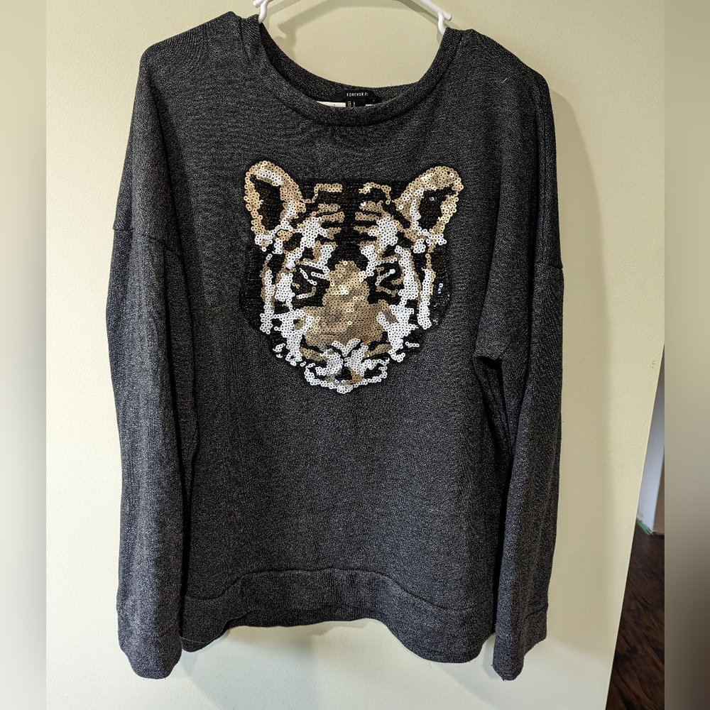 Sequin lion sweatshirt